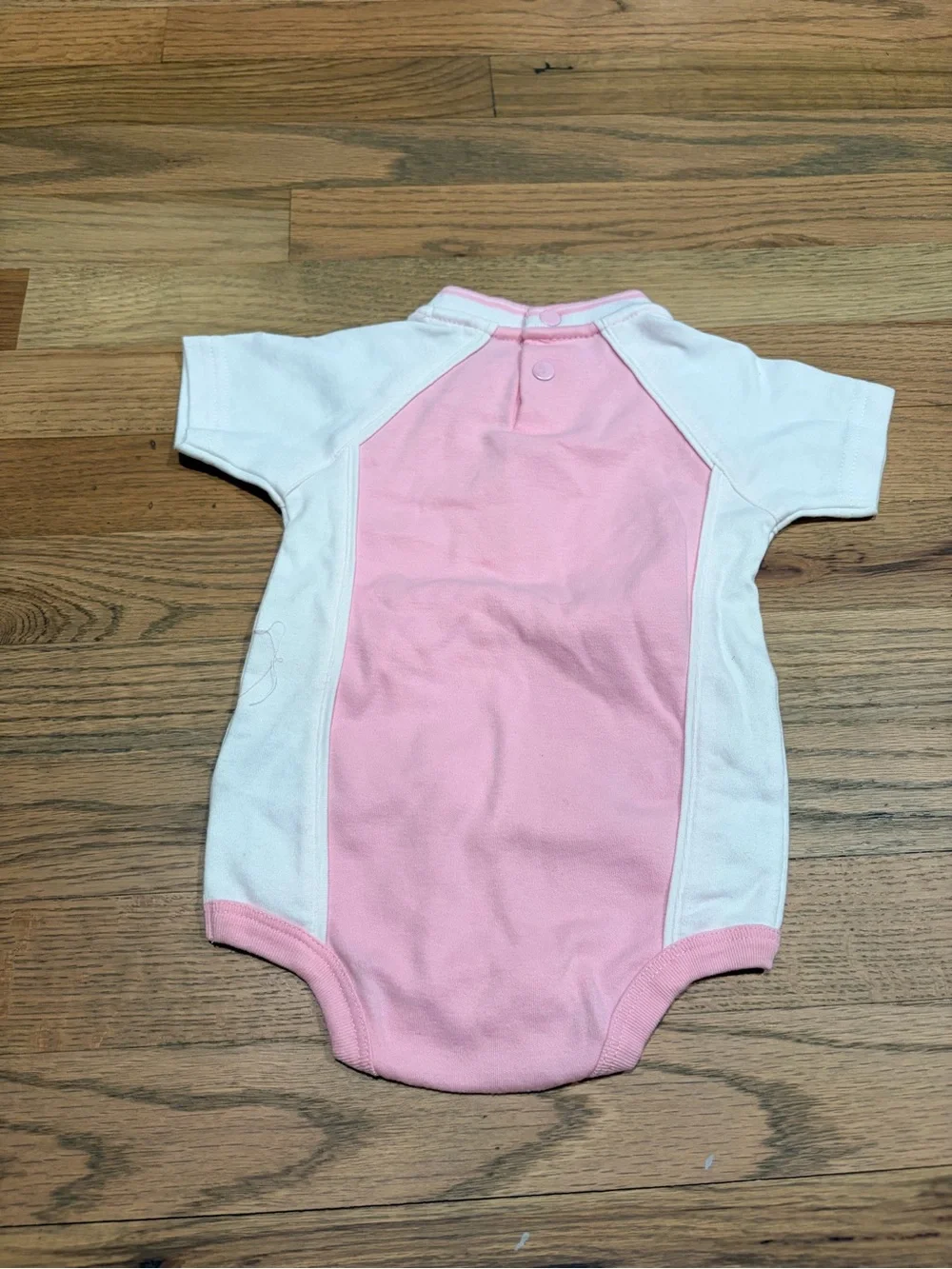 Nike light pink Yankees onesie